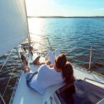 A couple enjoying a romantic sunset sail with St. Augustine Sailing in St. Augustine.